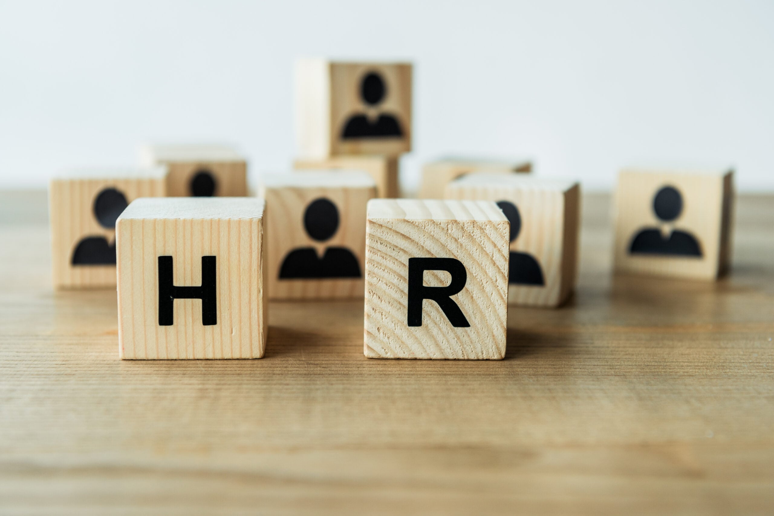HR Blocks on a Wooden Table